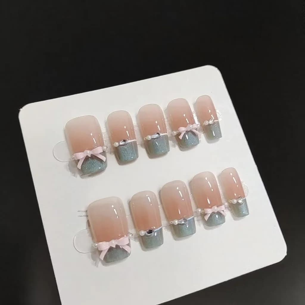 ブルーキャッツアイフレンチピンククリスタルリボン付け爪